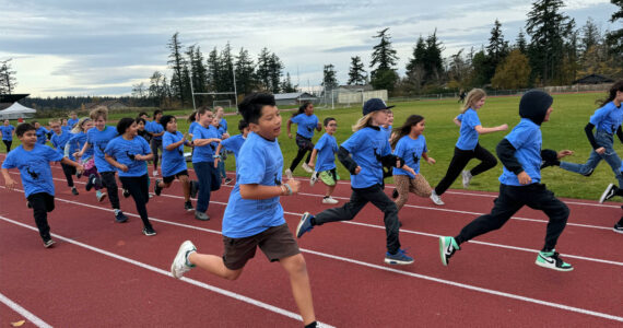 Joyful runners on the school track during the fun run on Nov. 8.