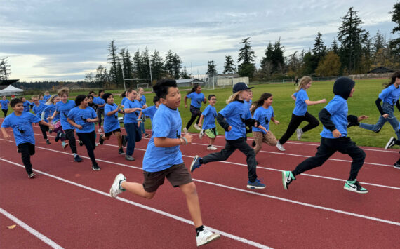 Joyful runners on the school track during the fun run on Nov. 8.