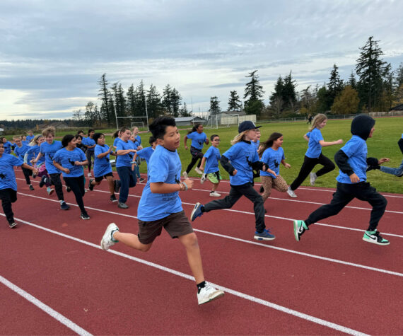 <p>Joyful runners on the school track during the fun run on Nov. 8.</p>