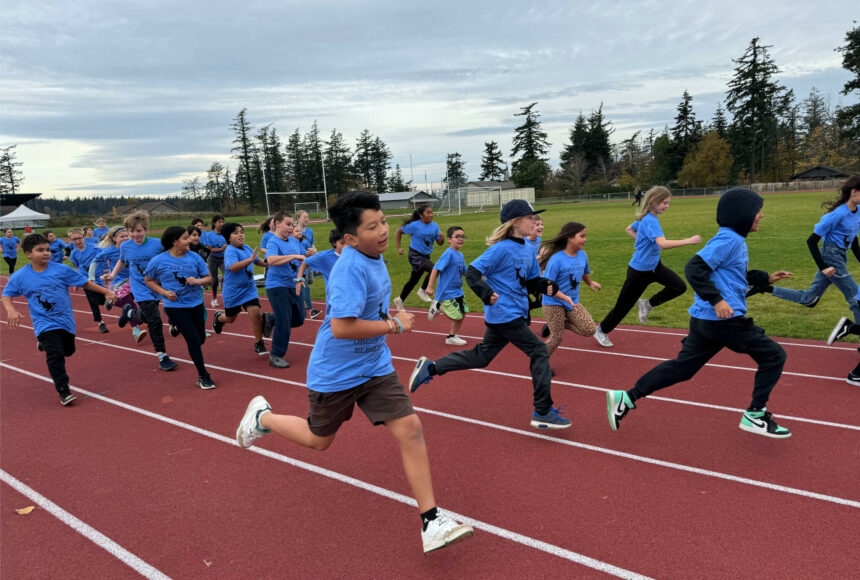 <p>Joyful runners on the school track during the fun run on Nov. 8.</p>