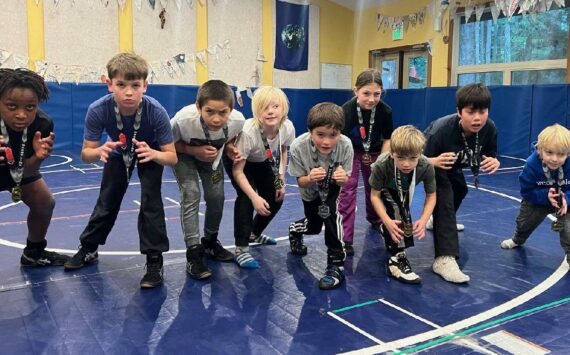 Wrestlers back at practice after returning from the WWKWL Novice Tournament in Stanwood. Pictured from left to right: Anston Feagins, Greyson Howard, David Nunez, Cru Hawley, Caden King, Aria Griffin, Elliot Wooding, Weston Wooding and Brooks Hawley.