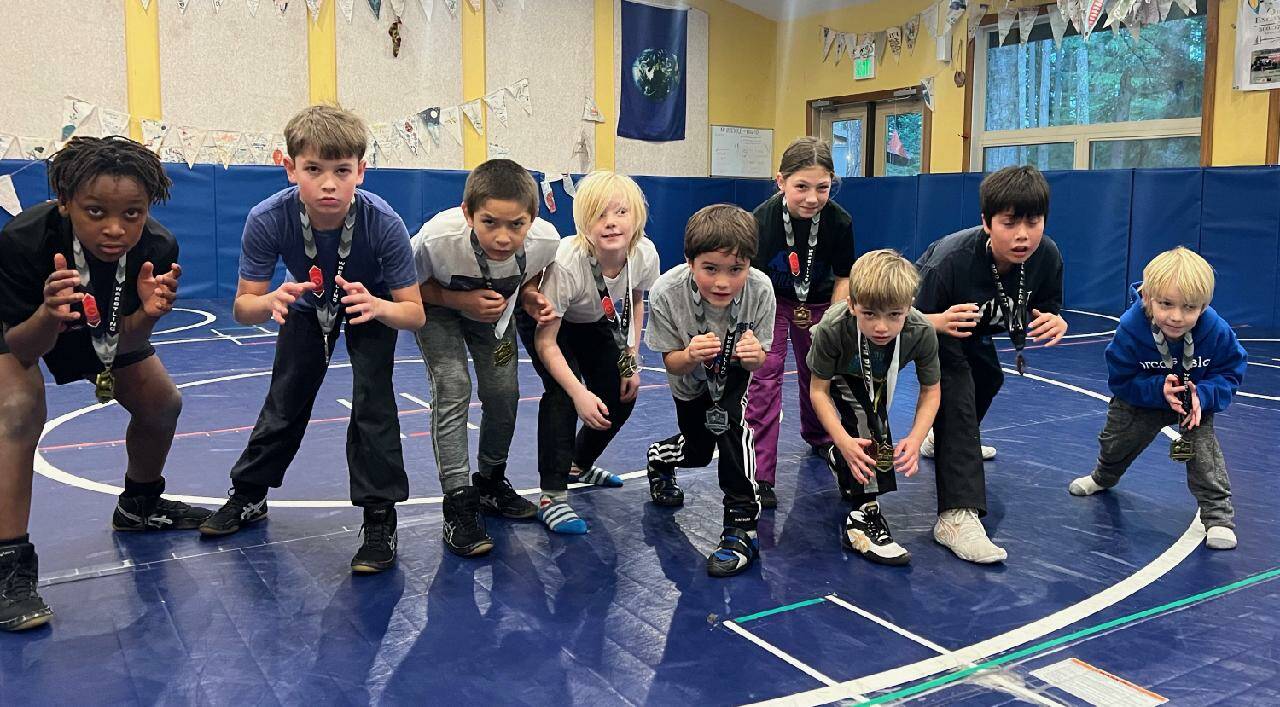 Wrestlers back at practice after returning from the WWKWL Novice Tournament in Stanwood. Pictured from left to right: Anston Feagins, Greyson Howard, David Nunez, Cru Hawley, Caden King, Aria Griffin, Elliot Wooding, Weston Wooding and Brooks Hawley.