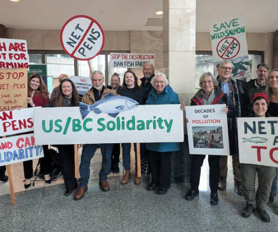 Members of the Our Sound, Our Salmon coalition celebrating in Olympia, WA on January 7, 2025 moments after the Board of Natural Resources approved a new rule permanently banning commercial net pen aquaculture.